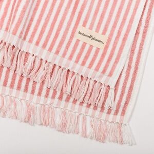 Business & Pleasure Co beach towel in Lauren’s pink stripe fringe white stripes